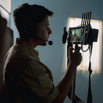 Traje y Tupper Director